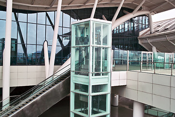 Image showing Glass elevator and escalator