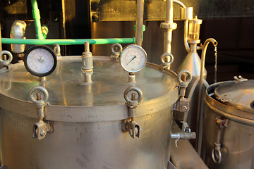 Image showing distillation of essential oils in factory