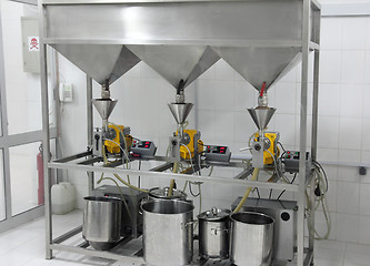 Image showing extraction of oils in factory