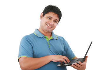 Image showing Happy young man with laptop - isolated on white 