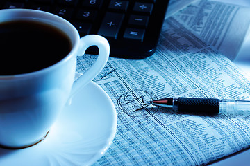 Image showing cup and calculator