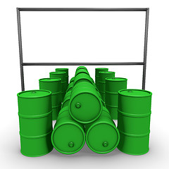 Image showing Green barrels with blank billboard