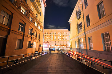 Image showing night view from the court into the lighted street