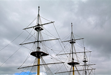 Image showing ship masts on cloudy sky