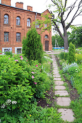 Image showing lane in park near old-time building