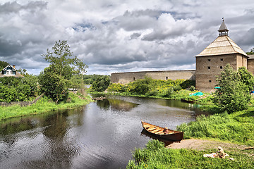 Image showing wooden boat on coast river