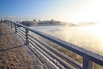 Image showing town bridge on cool river