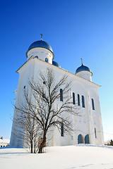 Image showing christian orthodox male priory amongst snow