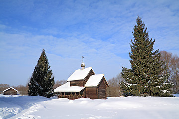 Image showing wooden chapel in winter village