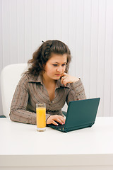 Image showing The young business woman at office