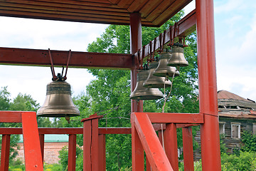 Image showing small bell in wooden summerhouse