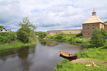 Image showing wooden boat on coast river