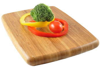 Image showing fresh vegetables on a cutting board 