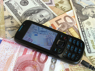 Image showing mobile on money 