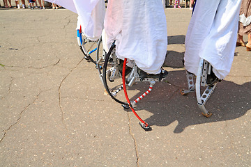 Image showing people on stilt