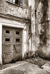 Image showing aging door in destroyed building