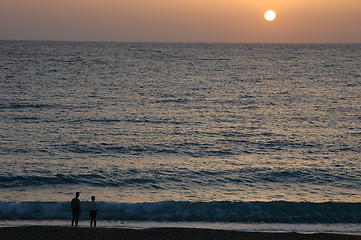 Image showing Couple watching sunset