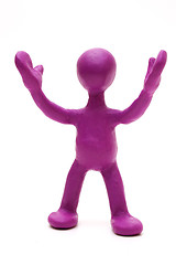 Image showing Purple puppet of plasticine signing by hands