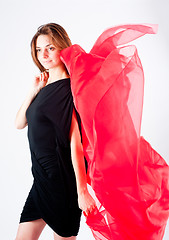 Image showing Pretty woman with red scarf