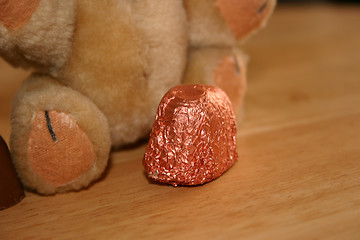 Image showing chocolate in front of a teddy
