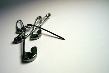 Image showing four safety pins