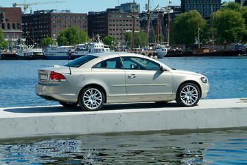 Image showing Car parked on a floating pier