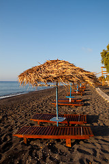 Image showing Sunbeds in Perissa, Santorini, Greece