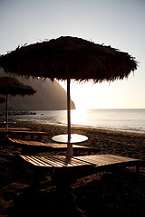 Image showing Sunbeds in Perissa, Santorini, Greece