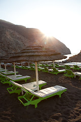 Image showing Sunbeds in Perissa, Santorini, Greece