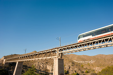 Image showing Train crossing a bridge