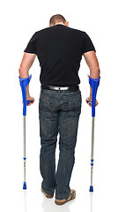 Image showing man with crutch