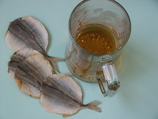 Image showing Beer and a fish