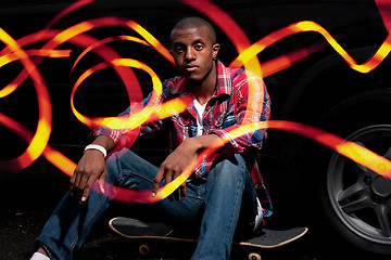 Image showing Cool Skateboarder Hanging Out with Light Trails