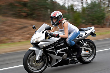 Image showing Speeding Motorcycle Woman