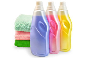 Image showing Fabric softener with a stack of towels