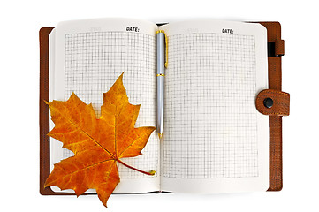 Image showing Notebook with a maple leaf