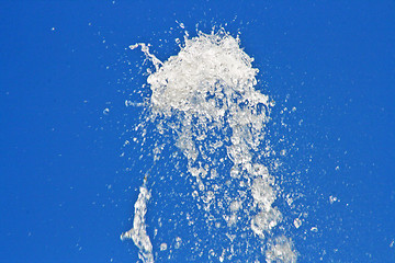 Image showing  fountain of water against blue sky