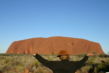 Image showing woman carrying ayers rock