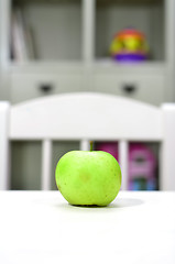 Image showing green apple on the table in the nursery