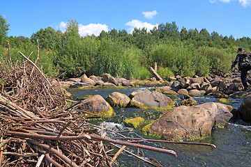 Image showing quick river flow amongst stone