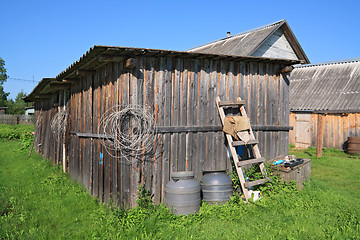Image showing rural shed on green herb