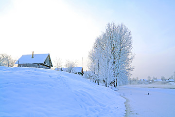 Image showing snow village on coast river