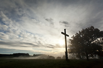 Image showing dramatic sky and a cross