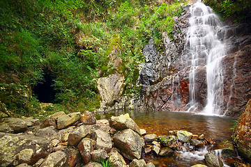 Image showing waterfall and mountain cave