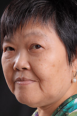 Image showing asian woman on black background 