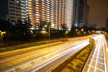 Image showing urban area dusk, busy traffic 