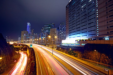 Image showing urban area dusk, busy traffic 