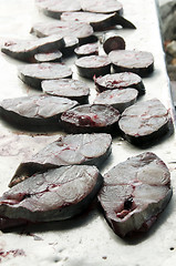 Image showing fresh king fish fillets steaks on cutting board