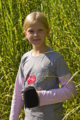 Image showing Little girl in the grass