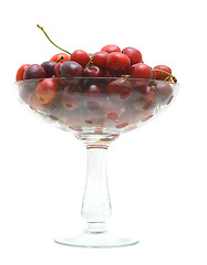 Image showing Sweet cherry fruits in a glass vase.